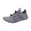Gray Savanna Adventure barefoot shoe with elastic toggle laces and blue arrow logo on the heel panel